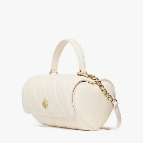 Kate Spade Heart Barrel Quilted Crossbody meringue color. NWT.